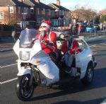 Salford Santa Scooter Run  to The Christie
